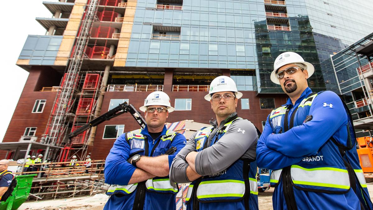 Commercial contractors smiling on jobsite