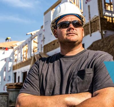 Contractor standing on job site