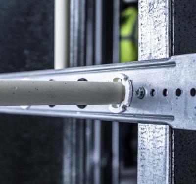 CPVC pipe support bracket with acoustic insert for quiet installations