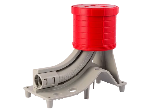 Curved plastic pipe support used to secure plumbing lines during installation
