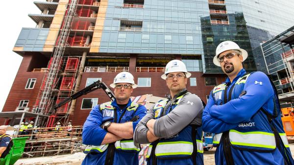 Commercial contractors smiling on jobsite