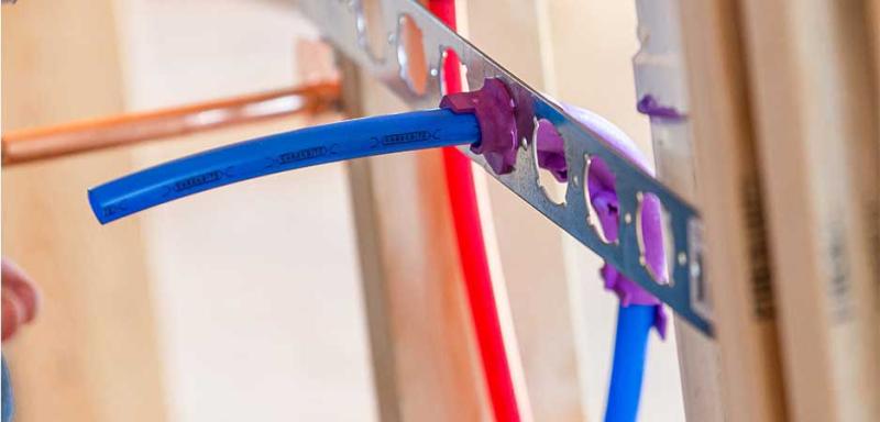 the 704 helps prevent damaged PEX stub-outs and extreme bend radius that could cause tubing to kink with in-wall pipe supports