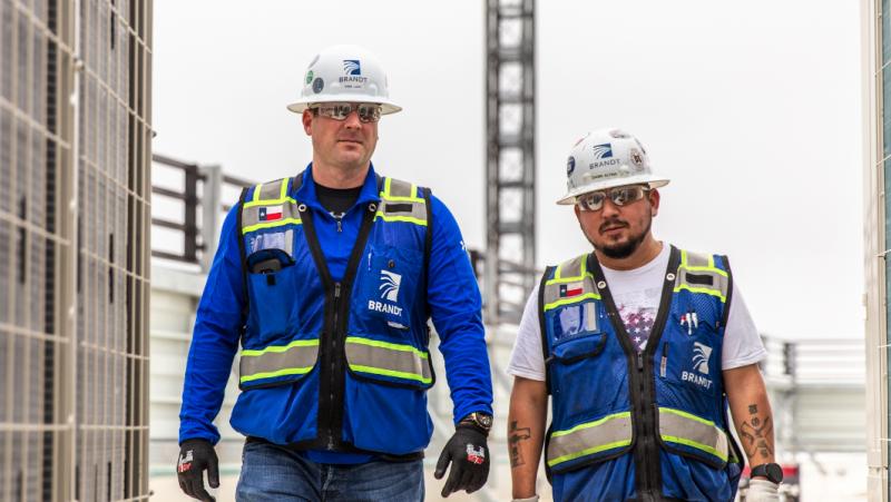 Two workers at a Dallas jobsite