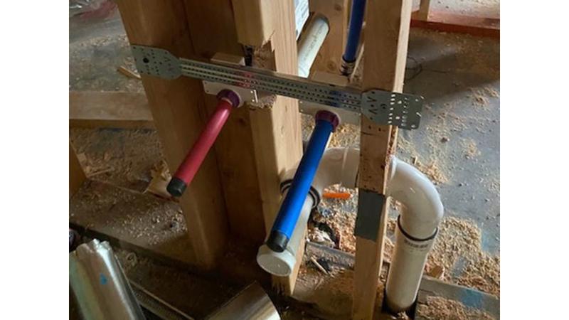 HoldRite bracket installation in NDI residence hall project.